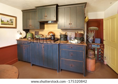 The Kitchen In A Primitive Colonial Style Reproduction Home, Built With Materials Reclaimed From Structures Built In The Late 1700\'S. The Room Contains Many Antiques From The Late 18th Century.