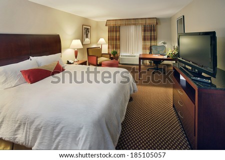 Idaho Falls, Idaho, USA July 16, 2008 The interior of a mid-scale hotel room, with a king size bed