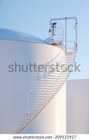 A large fuel tank a an automotive fuel tank farm