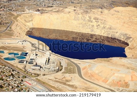 An aerial view of the evaporation pond and water treatment facilities at an open pit copper mine