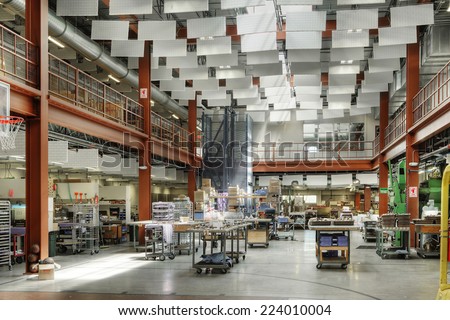 Sun Valley, Idaho, USA July 7, 2008  The interior of a factory, with noise suppression panels hanging from the ceiling, and energy saving practices with natural lighting, and energy efficient heating.