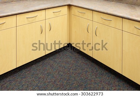 Modern cabinets in a new elementary school.  The cabinets are designed for function and economy.