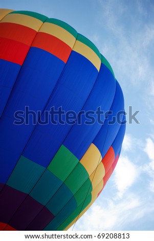 A colorful hot air balloon ready to lift off