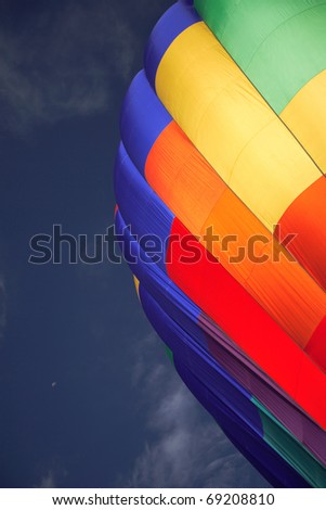 A colorful hot air balloon ready to lift off