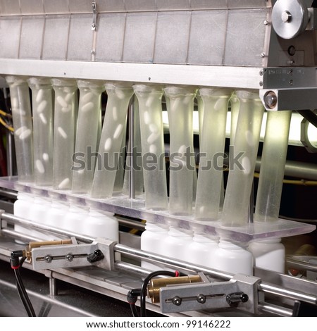 The pill counter in a pharmaceutical processing facility.