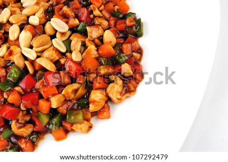 steamed vegetables and meat with  peanut on plate. Chinese cuisine.