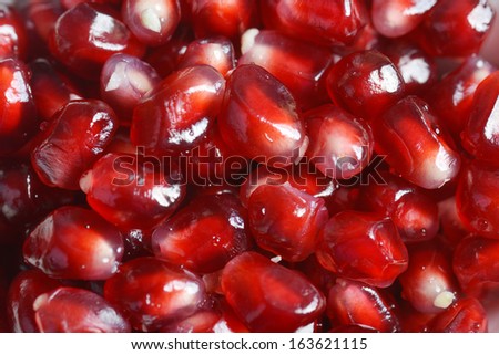 pile of fresh pomegranate seed. exotic fruit