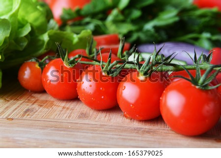 Fresh Vegetables. Included Are Tomatoes, Cucumber, Onions And Green Leaves