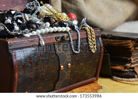 Wooden Treasure Chest With Valuables. Beads, Necklaces And Other Jewelry