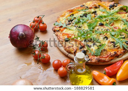 baked pizza with different ingredients