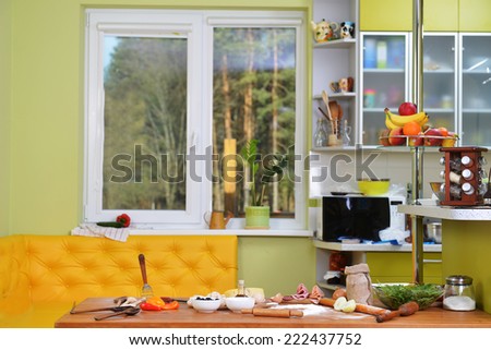 table with food in modern kitchen at home