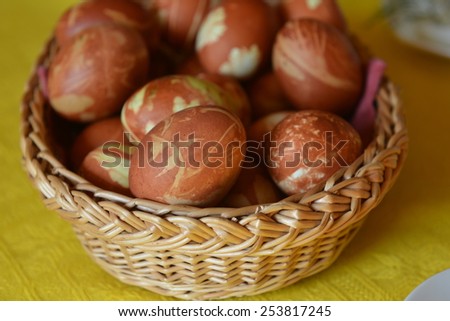 Easter eggs dyed onion skins in  basket