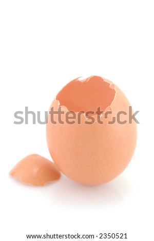 cracked chicken egg isolated on white background