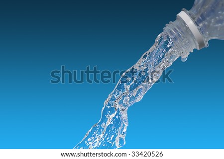 Water flows from  bottle on  blue background