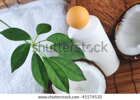 Coconut and massage oil for  body on straw napkin