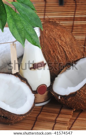 Coconut and massage oil for  body on straw napkin