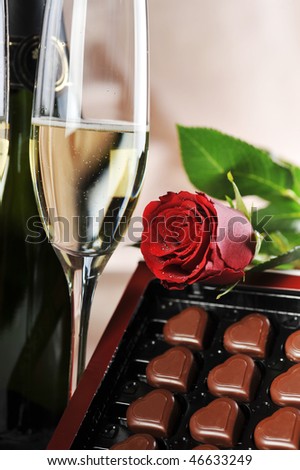 Heart shape chocolate, champagne  and red rose