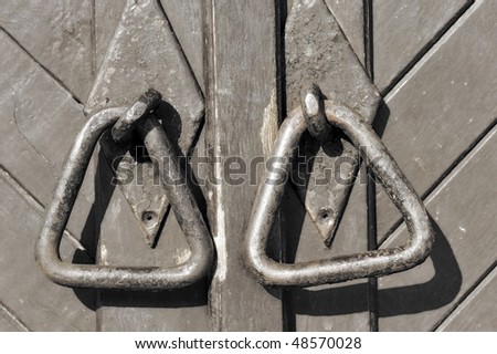 old wooden door and  doorknobs