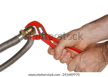 two hands are fixing a tube with gripper