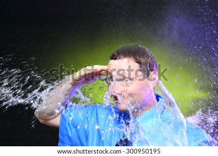 businessman with glasses is viewing under water