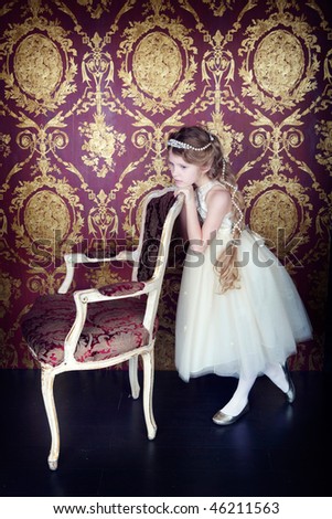 beautiful little girl in princess dress with long hair