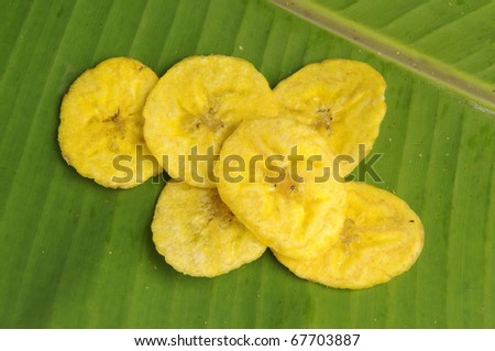 Indian snacks - Fried banana chips on banana leaf