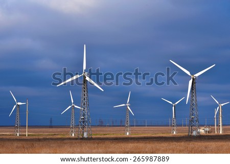Group of windmill for renewable electric energy production, landscape, cloud, sky