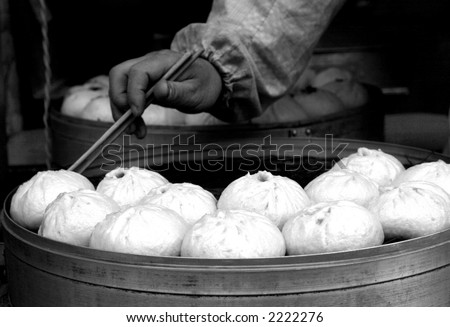Chinese food of dumpling, and chinese people called it Jiaozi, they eat Jiaozi expressing meaning of lucky and happy