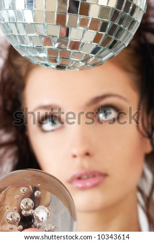 portrait with glass sphere and disco ball