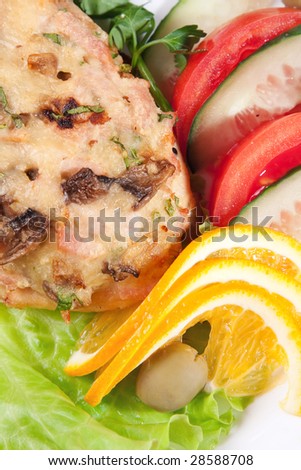 backed meat with salad and lemon
