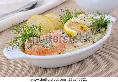 Salmon under gentle creamy lemon sauce with spices