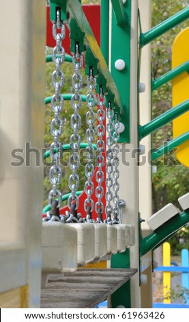 Suspension bridge on the chains (a fragment of the playground to play on the street)