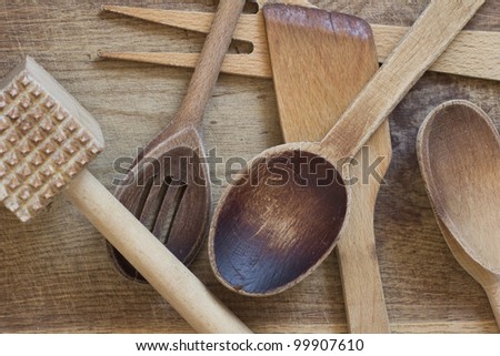 wooden cutlery scattered on the board