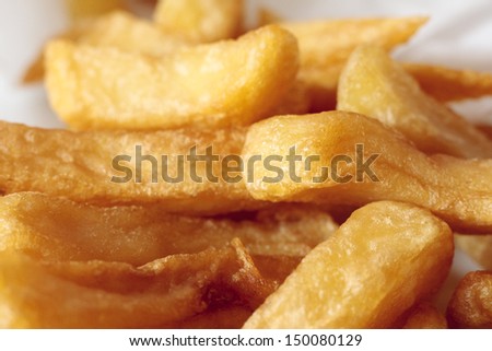 Close-up of classic deep fried chip shop chips