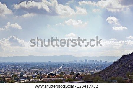 Arizona capital city of Phoenix as seen from Northern Mountain; Backlit