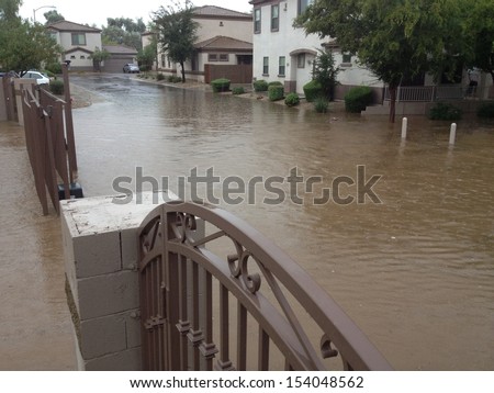Standing rain water of monsoon season in gated housing community, Phoenix, Arizona