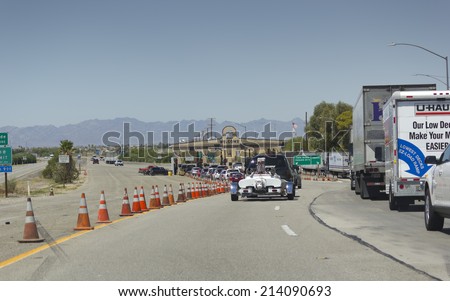 BLYTH, CA - AUGUST 17, 2014: Cars lined up at California Agriculture Control near Arizona-California border crossing on Interstate-10