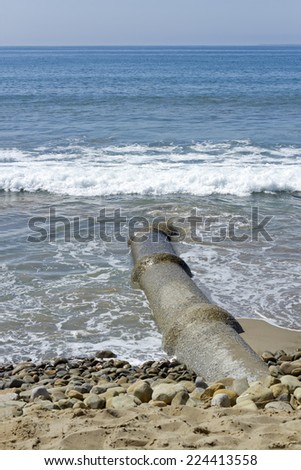 Rain water drainage pipe near Ventura ocean beach, California