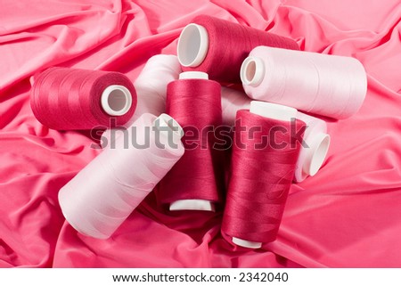 Light Pink and Purple Threads on Middle Pink Cloth