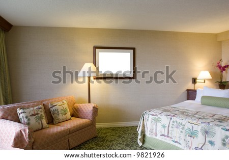 Cozy Bedroom with Queen Bed and couch next to Window and Lamps; isolated picture, clipping path included