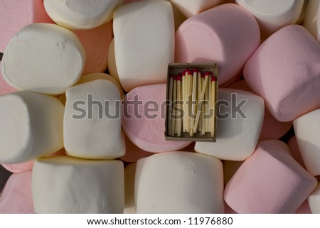 Extra giant marshmallows background with matchs in box for size compare