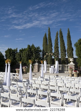 Bride and Groom Ceremonial Altar with Rows of Guests Seats