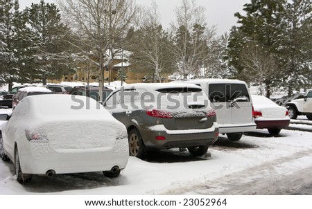 Frozen Car Snow Drifts on Outdoor Parking Lot