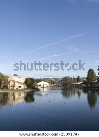 South California Lake Housing Community in front of Mountain Range