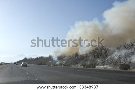 Smoky Wild Brush Fire along Interstate Highway Ten, California
