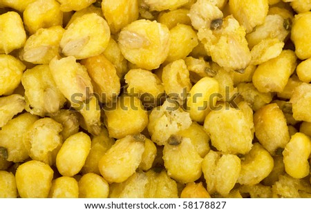 Corn nuts roasted and salted background, close up