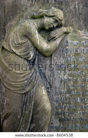 stock photo stone statue in a cemetery graveyard in london england