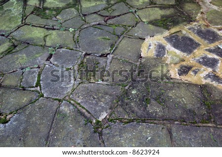 path with large rough stone plates of different shapes and sizes in london
