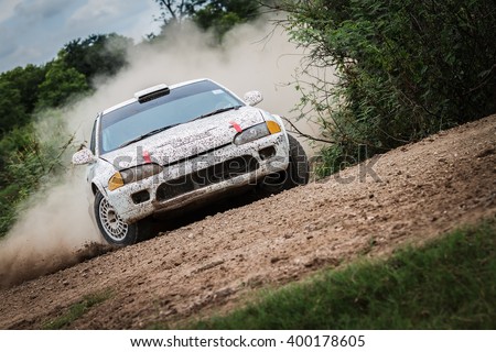 Rally car on dirt track