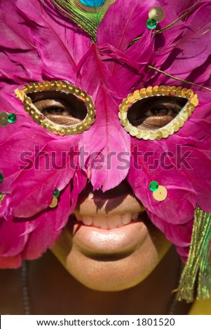 Young African girl with mask.